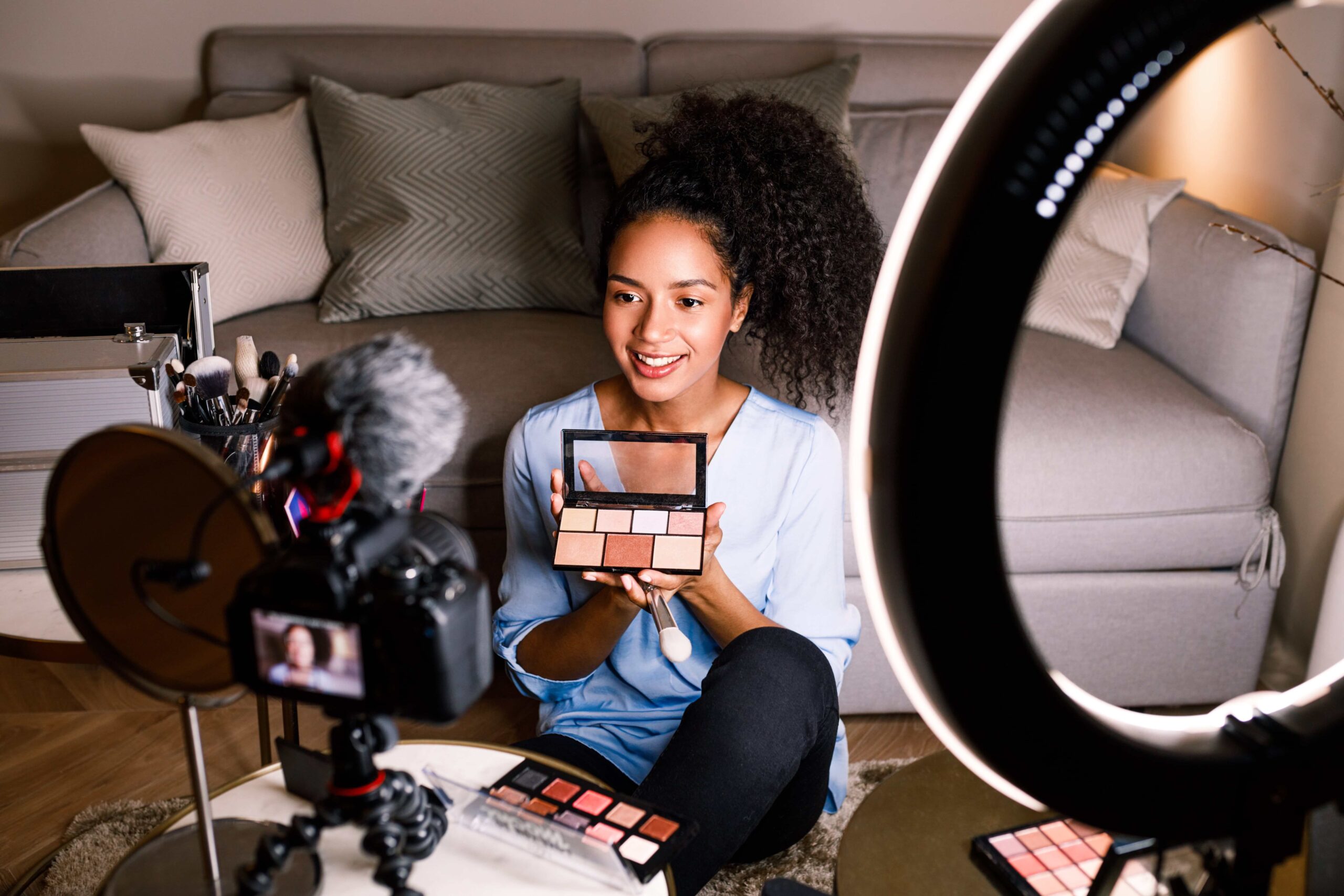 Beauty influencer showing her follows an item she was gifted by a company