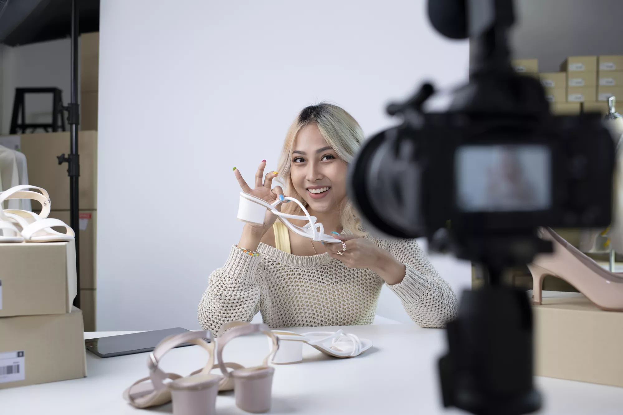 Fashion influencer filming a product promotion for her followers