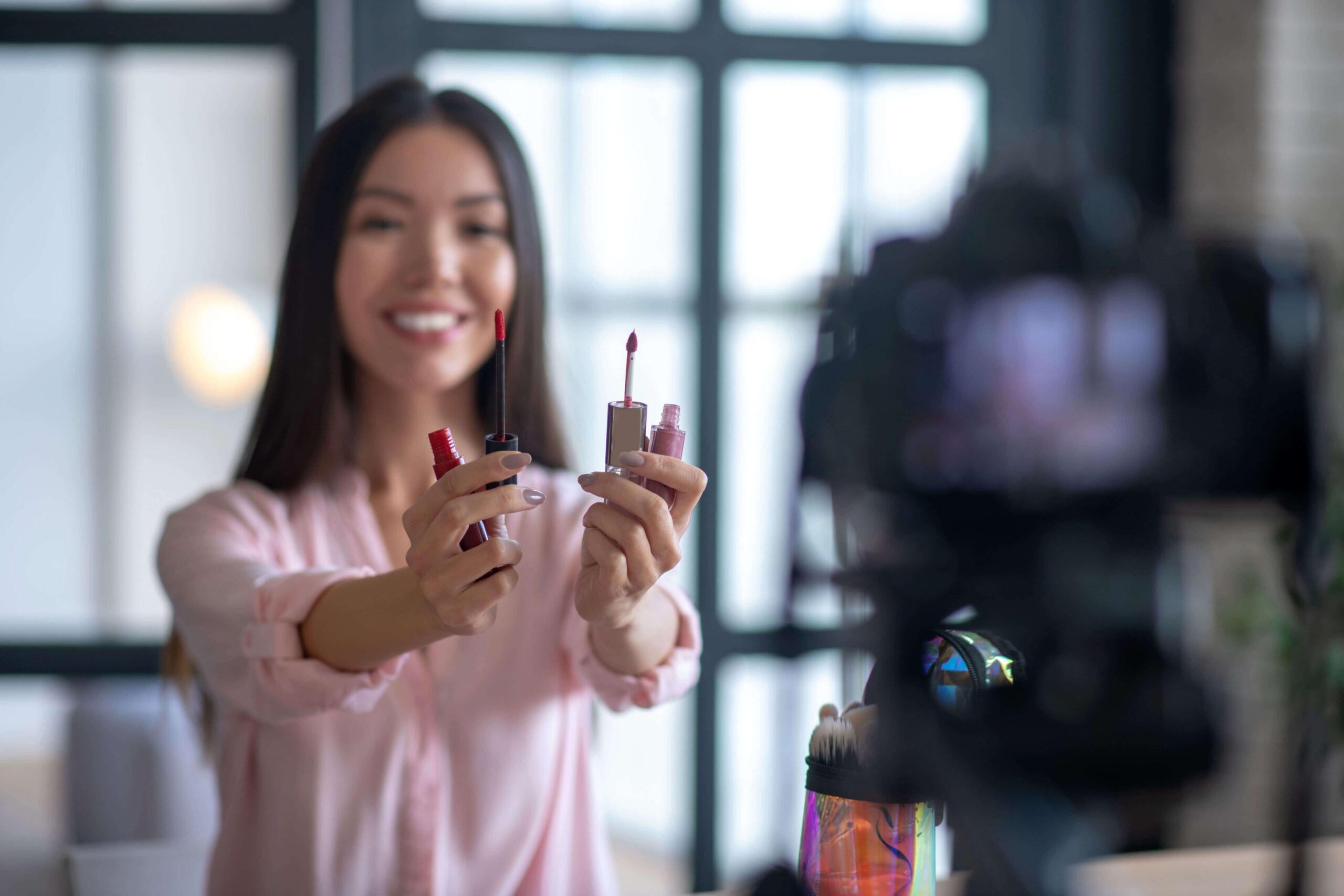 Social media content creator promoting beauty products